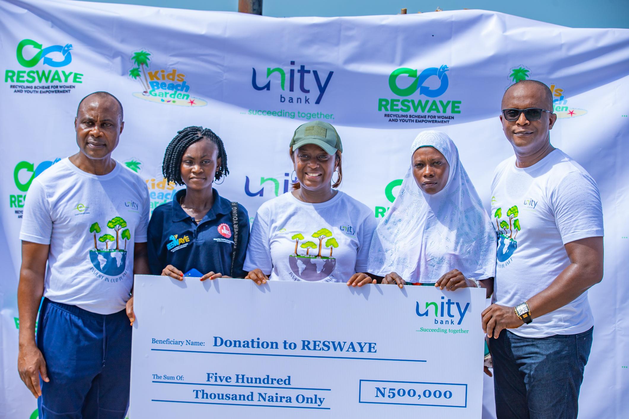 Unity Bank, RESWAYE clean Lagos Beach, plant trees to celebrate World Earth Day 2022